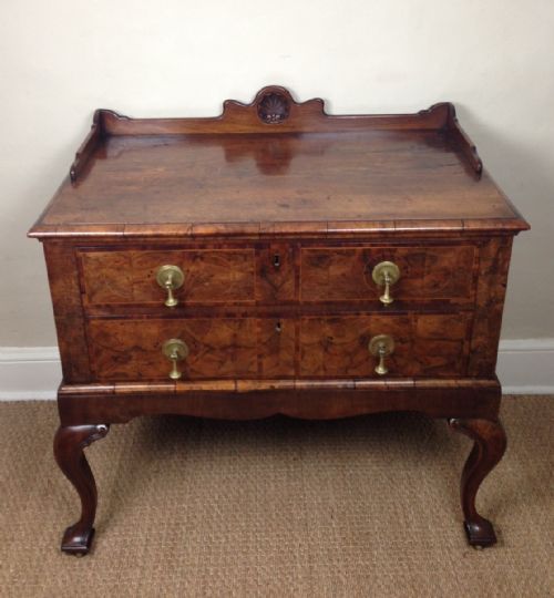 fig 1. A Queen Anne style walnut chest on stand c 1890