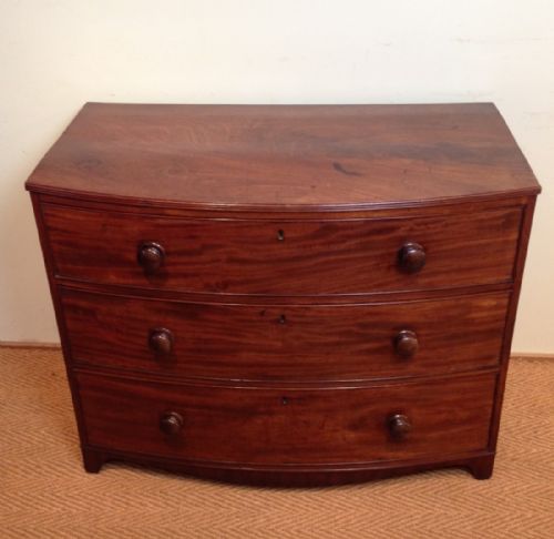 fig 1. A late Regency mahogany bowfront chest of drawers c 1830