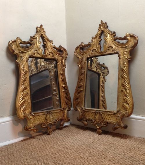 A Pair of 19th C Florentine Cartouche Shaped Wall Mirrors C 1870