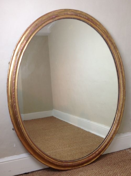 A Large English Gilt Oval Mirror C 1860