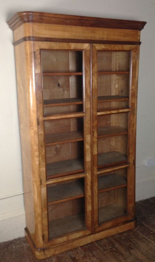 A French Fruitwood and Walnut Standing Glazed Bookcase C 1870