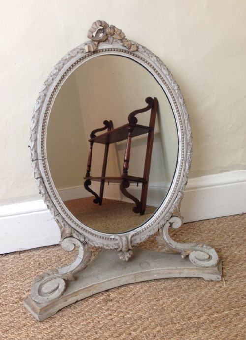 A Late 19th Century Painted and Parcel Gilt Oval Dressing Table Mirror