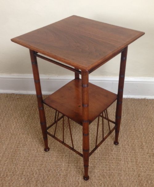 An Aesthetic Movement Walnut Table Designed by E W Godwin C 1880.