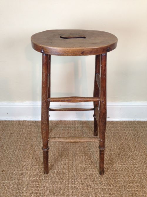 A Victorian Elm Oval Topped Bar Stool C 1890