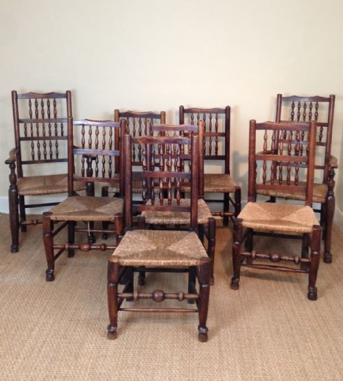 A Harlequin Set of 8 Late C 18th Lancashire Spindle Back Chairs