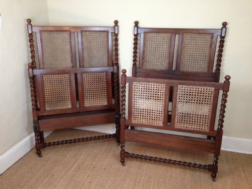 A Pair of Heals Oak and Cane Single Beds C 1930