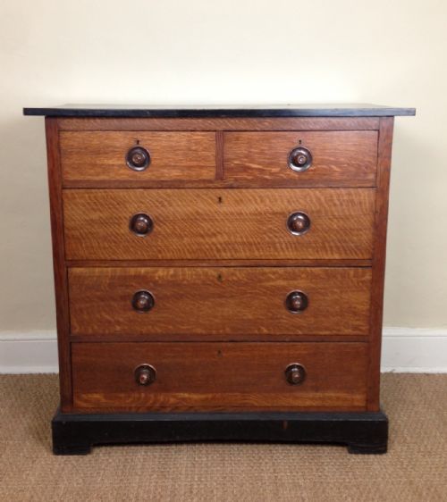 A Liberty Oak and Ebonised Chest of Drawers C 1900