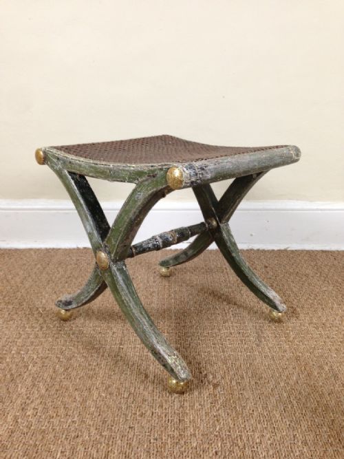 A Regency Painted and Parcel Gilt Saddle Seated Stool C 1820