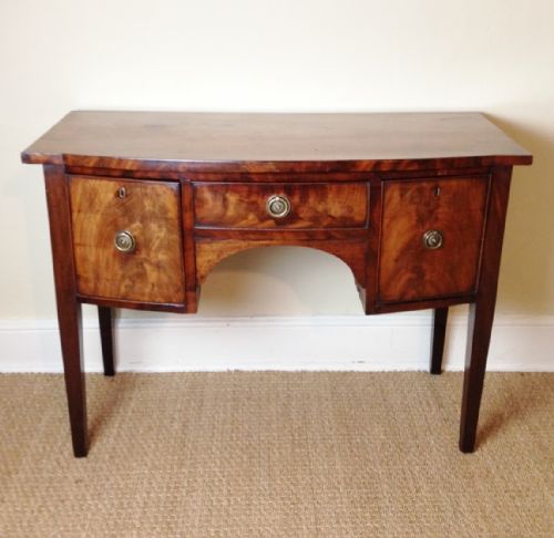 A Regency Mahogany Bow Front Sideboard or Dressing Table C 1810