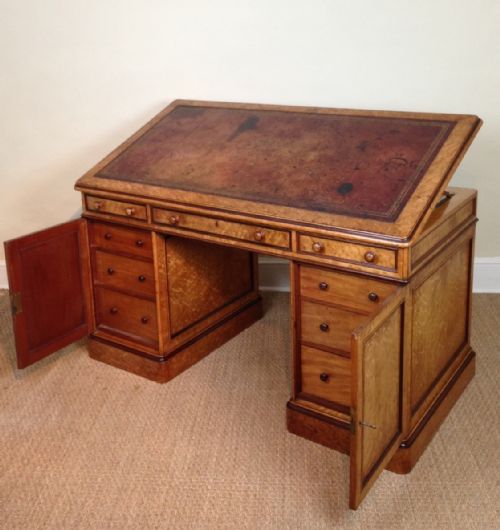 An Early Victorian Birds Eye Maple and Purple Heart Partners Desk C 1860 by Holland and Sons London 
