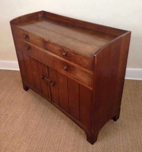 A Heals Oak Letchworth Dresser Designed by Sir Ambrose Heal in 1908 for the Letchworth Garden Suburb Exhibition.

