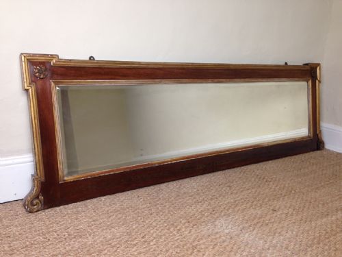 A Mid 19th C Walnut and Parcel Gilt Mirror C 1860 by Howard and Sons