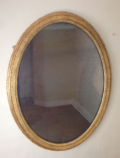 A Large Late Regency Gilt Oval Mirror C 1830