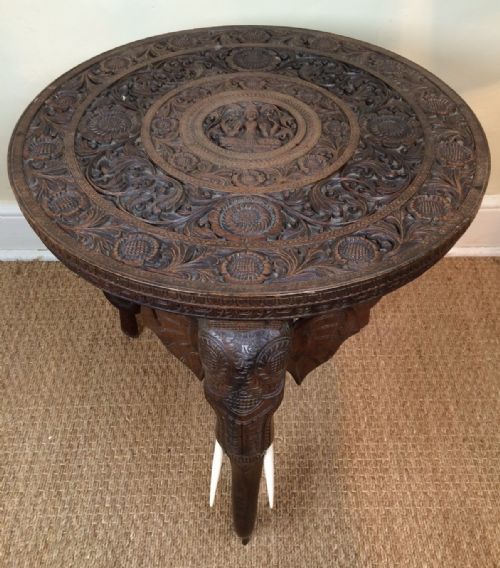 An Indian Carved Teak Circular Elephant Table. Bombay C 1910