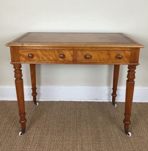 A Victorian Satinbirch Writing Table by Heals C 1880