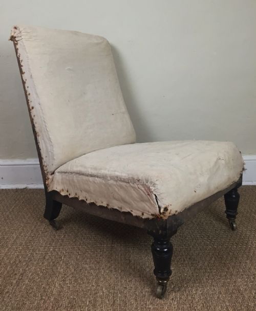 Gillows. A 19th C Ebonised Nursing Chair Stamped Gillow & Co