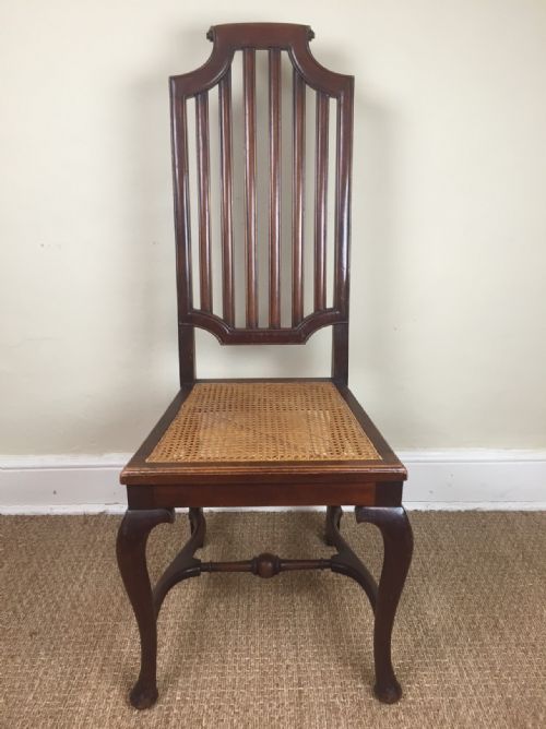 A Bombay Furniture Company Teak and Cane Chair C 1920 in Early Dutch Colonial Style