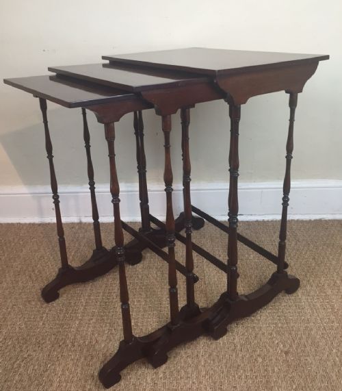 A Nest of Late 19th Century Mahogany Tables with Three Separate Tables on Ring Turned Legs.
