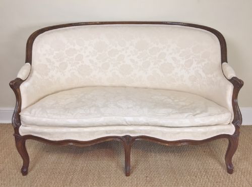 A Small Mid 19 Century French Walnut Two Seater Sofa