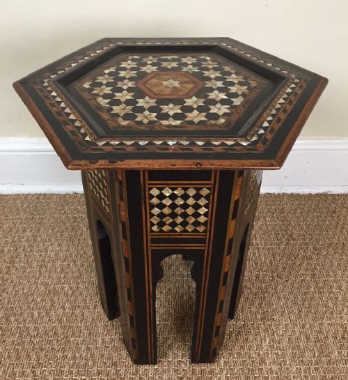 A Damascus Hexagonal Mother of Pearl and Ebony Islamic Table Circa 1910.