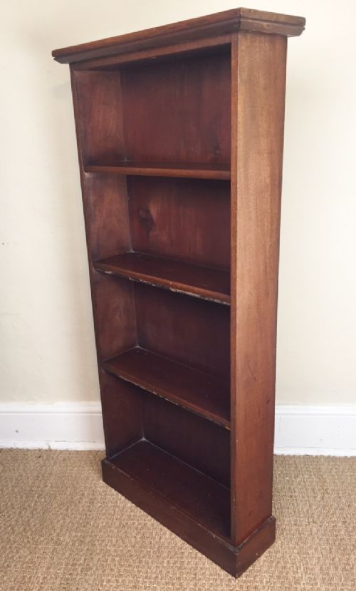 A Small Victorian Mahogany Open Bookcase Circa 1880 with Three Fixed Shelves on Plinth Base.