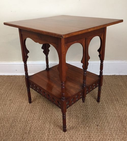 A Liberty Square 2 Tier Walnut Table in the Moorish Style Circa 1895