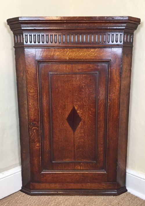 A George 111 West Country Oak Corner Cupboard Circa 1800