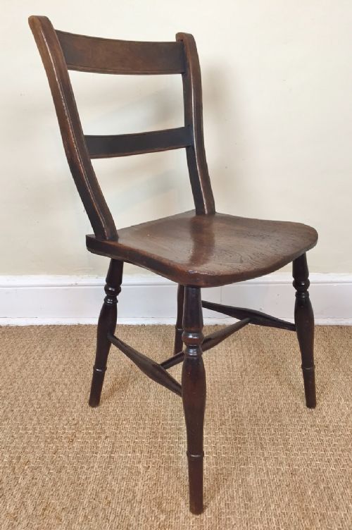 A Mid 19 Century Oxford Bar Back Fruitwood and Elm Windsor Chair