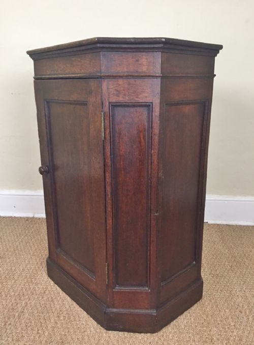 An Unusual Late Georgian Oak Octagonal Plate Warmer or Huffer C 1820