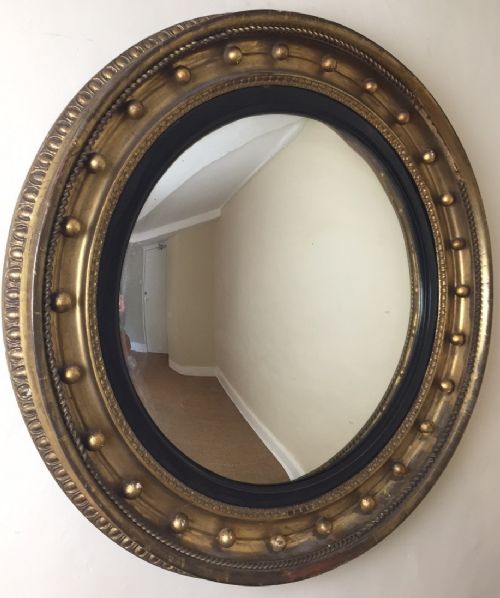 A Large Regency Convex Mirror Circa 1820 in Totally Original Condition.