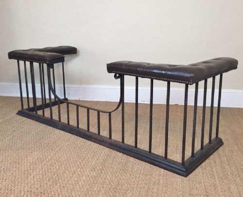 A Large Edwardian Cast-iron Club Fender Circa 1910 with Dark Brown Leather Top.