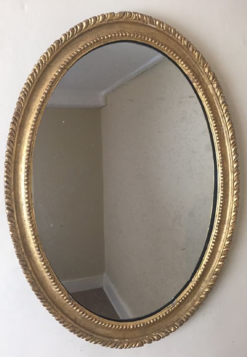 A George 111 Gilt Oval Mirror Circa 1800