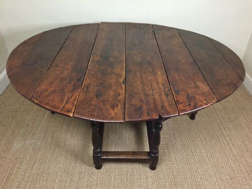 A Large Queen Anne Elm Gateleg Table Circa 1710