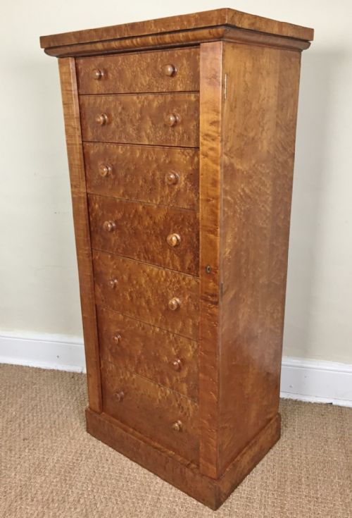 A Fine Victorian Birdseye Maple Seven Drawer Wellington Chest Circa 1860