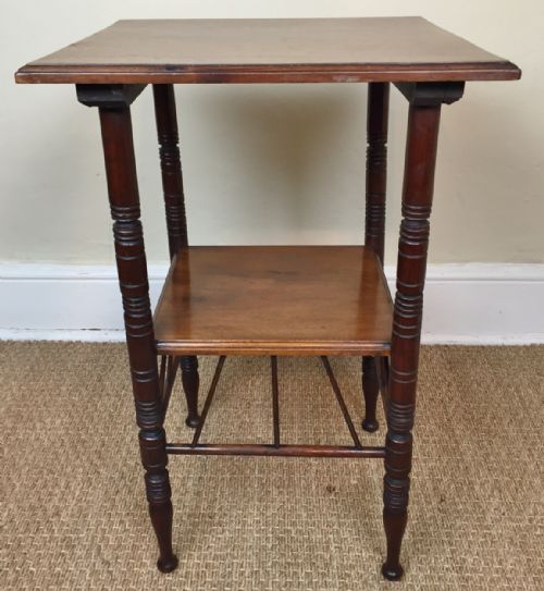 An Aesthetic Movement Walnut Two Tier Table Designed by E W Godwin Circa 1880