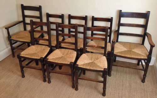 A Set of 8 Arts and Crafts Oak Dining Chairs C 1920