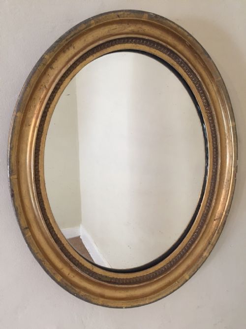 An English Water Gilt Small Oval Mirror C 1870