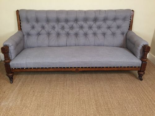 A Gothic Reform Oak and Ebonised Sofa Circa 1875