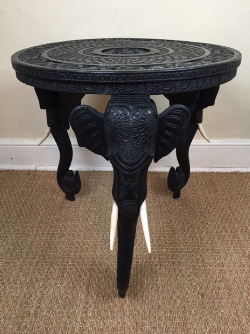 A Bombay Blackwood Circular Carved Elephant Table Circa 1910