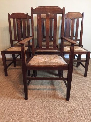 A Set of 7 Oak Arts and Crafts's Slat Back Dining Chairs C 1910