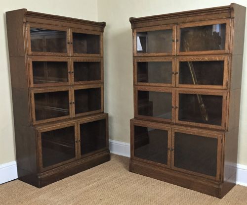 A Pair of Oak Glazed Minty 4 Section Bookcases Circa 1925