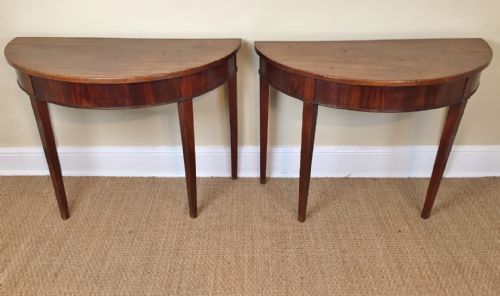 A Pair of George 111 Mahogany Demi Lune Side Tables Circa 1780.
