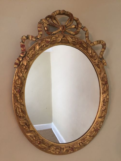 A Victorian Gilt Oval Mirror Circa 1880 in Original Condition.