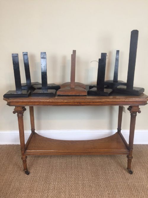 A Collection of 10 19th Century Ebonised Mahogany and Oak Plate Stands.