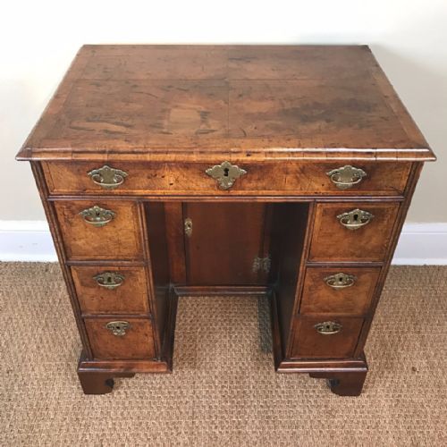 A George 1 Walnut and Feather Banded Kneehole Desk Circa 1725