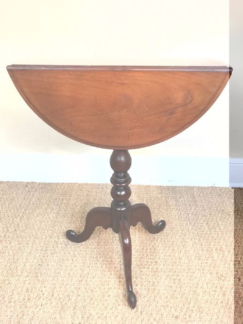 An Unusual Victorian Mahogany Drop Flap Tripod Table Circa 1870.