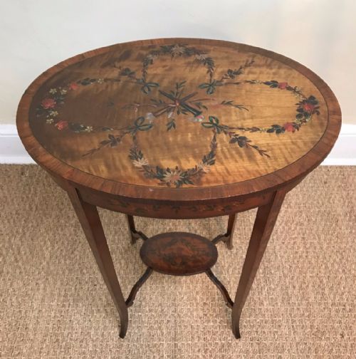 An Edwardian Satin Wood and Painted Oval Lamp Table Circa 1910