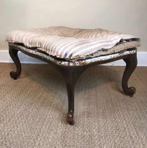 A Large Early 19th Century Continental Walnut Serpentine Shaped Stool.