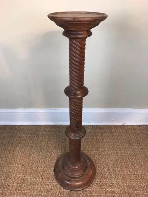 An Arts and Crafts Oak Torchere Circa 1910