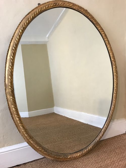 A Large Mid 19th Century English Oval Mirror Circa 1860